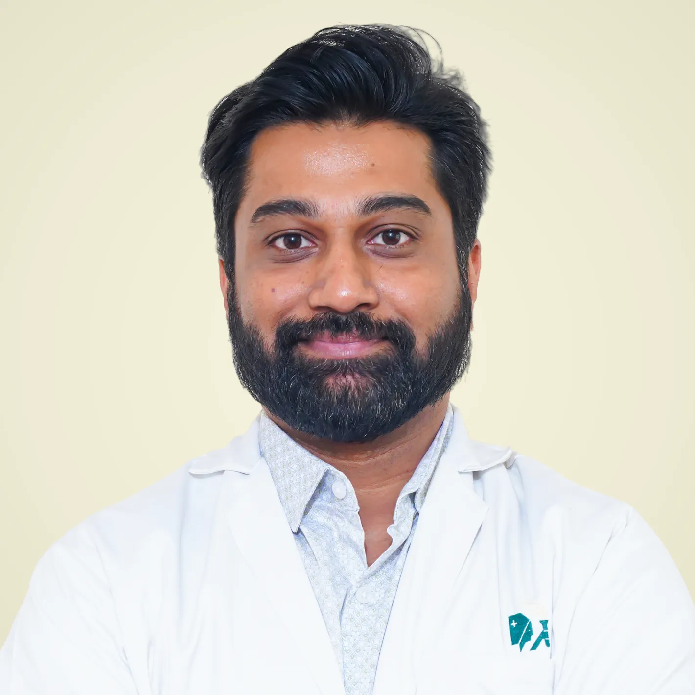 DR. TUSHAR B MUNNOLI